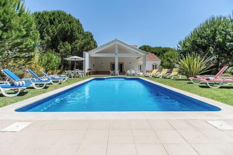 Swimming pool and garden in luxury villa.