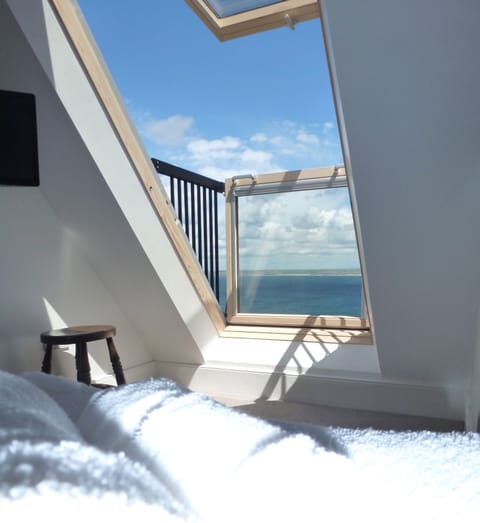 Balcony window in king ensuite bedroom