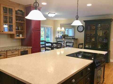 Large island in grand kitchen. Great for large gatherings.