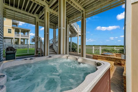 6-person hot tub near the firepit (offered at an extra charge of $175+tax)