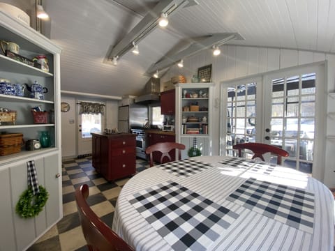 Seating area in kitchen close to the screened in porch