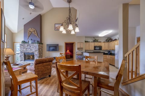 Seats 14 for meals (7 at table, 4 at flip top side table, and 3 at eating bar.