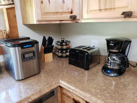 Icemaker, knives, spice rack, toaster, coffee maker -coffee & filters provided