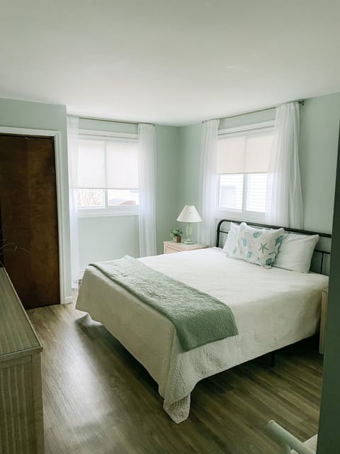 Primary bedroom with King bed and bathroom. 1st floor