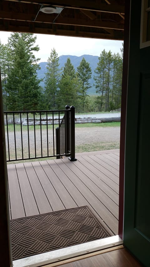 Deck looking to the West and the parking lot. Park in front of your cabin.