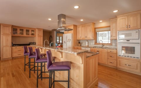 Center island great for serving buffet style meals or extra seating 