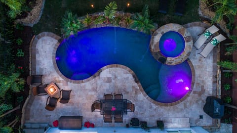 Gorgeous resort-style pool with spitters, tanning ledge, bubbler and large spa