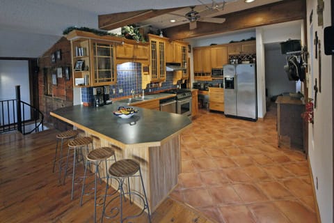 Extra seating at kitchen counter/table; fully stocked kitchen