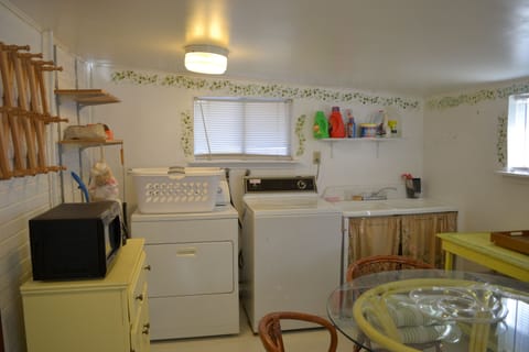 Large laundry room with microwave, Keurig coffee maker and extra kitchen table