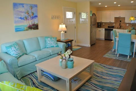 Unit A Living open to Dining and kitchen