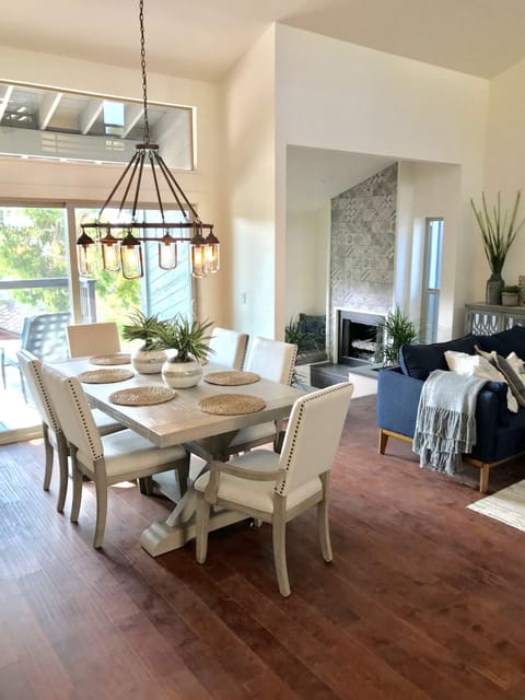 Lovely dining room and living room.  Dining table has leaves to accomodate eight