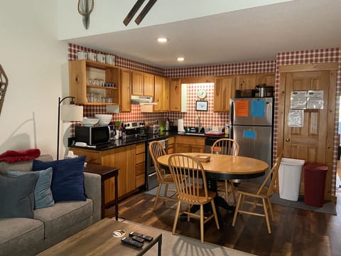 Bright and clean living room, kitchen and dining area