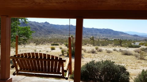 West facing bench swing has amazing sunset views!