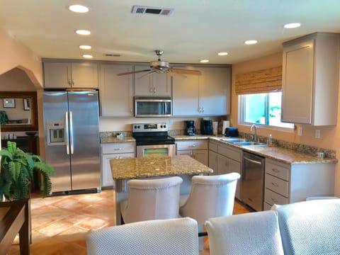 Kitchen with freshly painted cabinets as of August 2018.