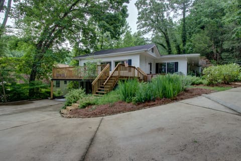 Year round view of lake from large deck, family room & kitchen windows