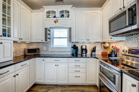 Fully-equipped Kitchen w/ Soundside views while you cook 