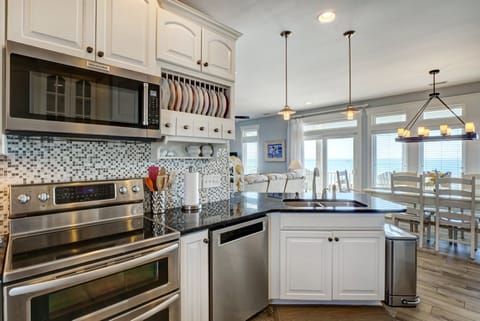 Fully equipped kitchen with sound view and oceanfront views.