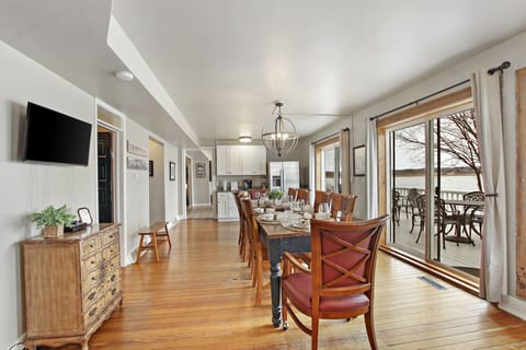 The large kitchen has two refrigerators - one on each end of the kitchen.