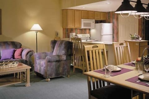 Full kitchen, living room, & dining room. (Deluxe). 