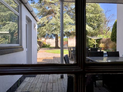 Covered seating area in garden