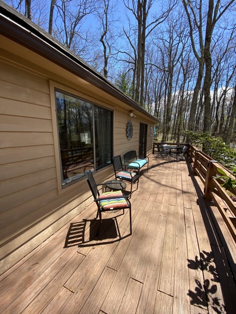 Large front porch with seating for coffee in the AM or drinks in the PM