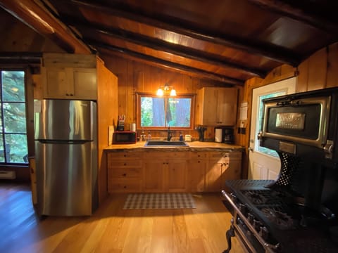 Fridge is placed in a much better position, adding more room in the dining room.