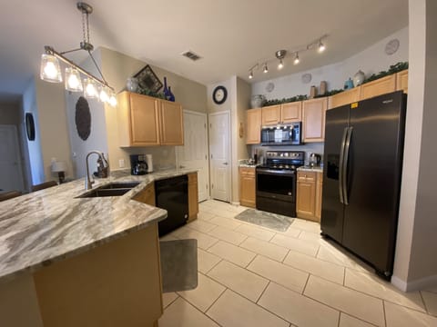 Spacious and well equipped kitchen