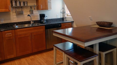 Kitchen has table that seats 4 people