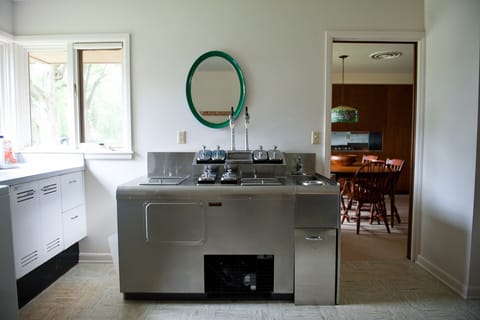Soda Fountain in the laundry room. Breakfast room and kitchen in background.