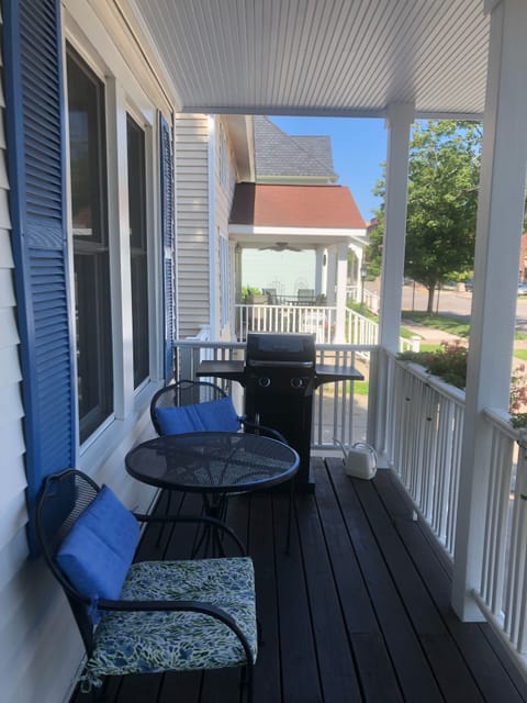 Under Cover porch with gas grill and seating for 4 