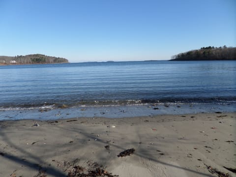 Small beach area located behind the house 
