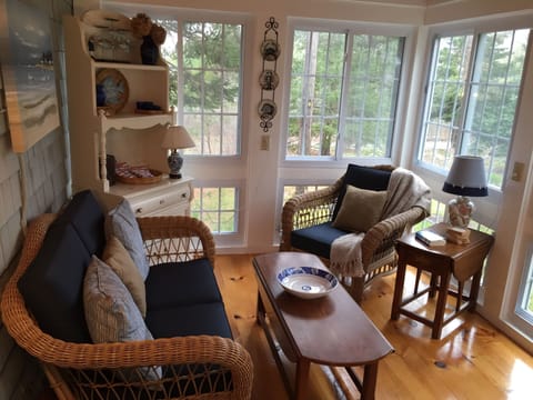 Welcome to the porch where you can relax after a day at the beach or golfing!