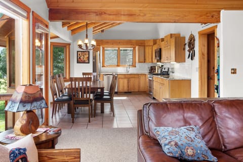 View from main living into dining and kitchen.