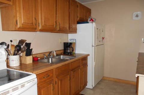 Galley kitchen offers plenty of room for food preparation.