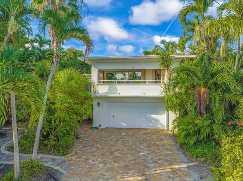 Street Front of Beach House and Four Car Driveway
