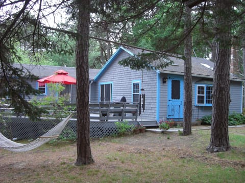 Cottage with guest wing and den addition