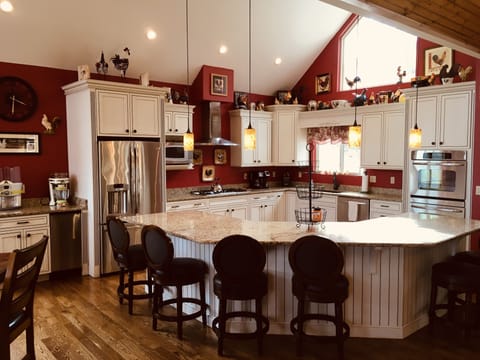 Kitchen with bar seating for 7