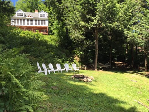 Lakefront lawn area with fire-pit 