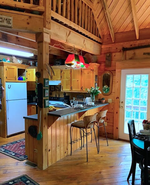 View of kitchen and eating table front front door