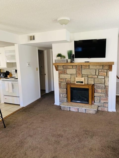 Cozy electric fireplace. Flat screen streaming tv.