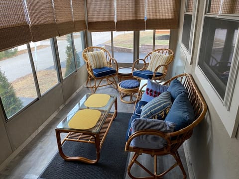 3 Season Porch with newly appointed furniture for relaxing