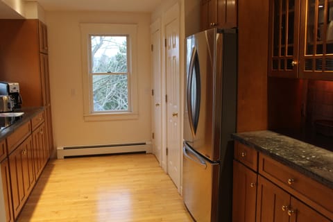 Kitchen view, showing new refrigerator (2016)