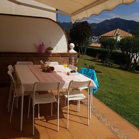 Eating outside with mountain view.