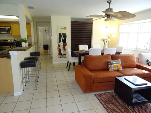 cozy dining and living with beautiful view over frontyard and blinds for evening