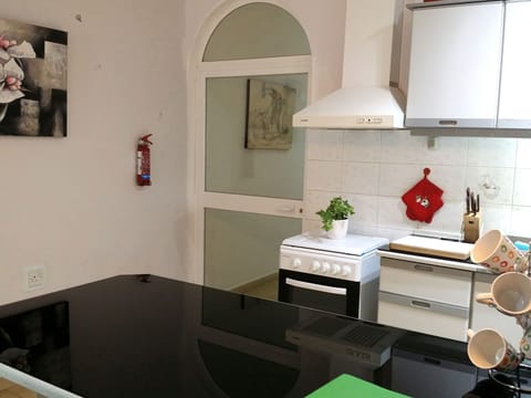 kitchen has dividing door from bedrooms to keep odours and noise out