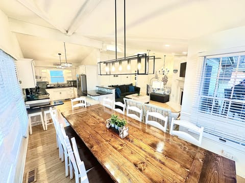 18 person seating at 12 person farm table and 6 counter seats.
