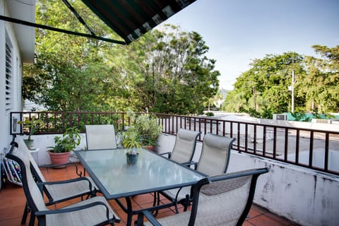 Patio with BBQ and table for six.
