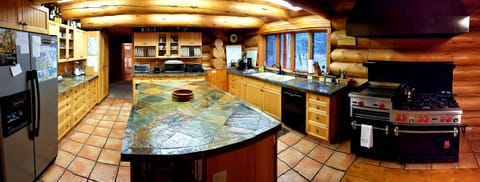 Huge Kitchen is a chef's delight! Everything a chef will need is in there!