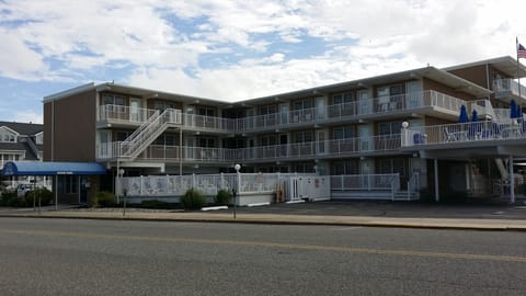 Atlantic Ave View of Property front pool gated and Welcome Office Blue Awning