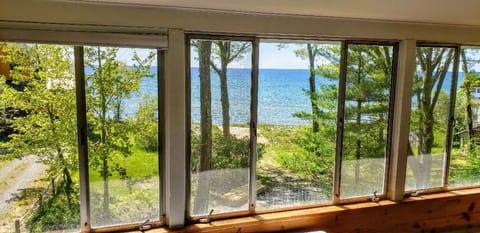 View from screened-in porch that runs along the entire lake side of the cottage